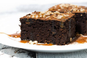 Custom brownies topped with nuts and caramel