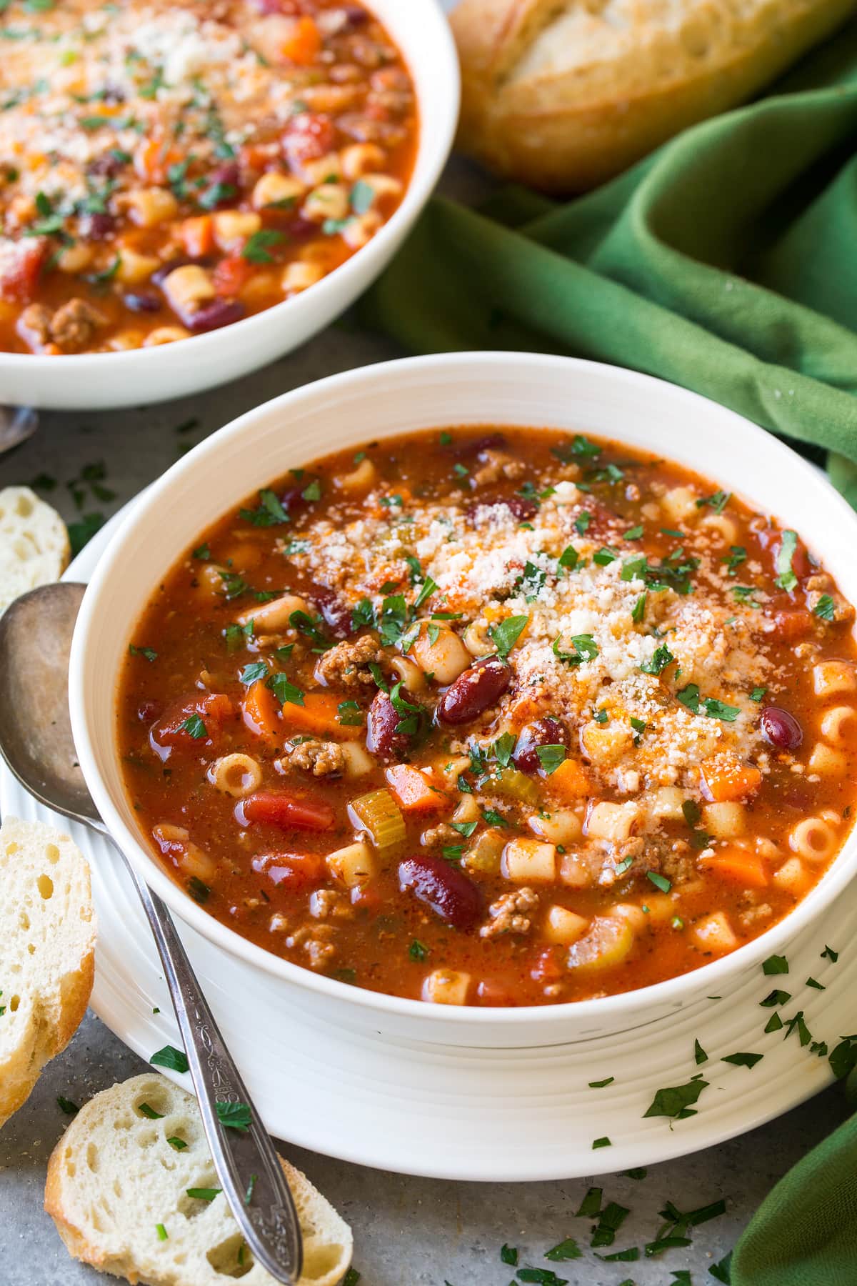 A hearty bowl of Pasta Fagioli with ground beef, Italian sausage, and beans in a tomato-based broth