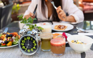 Clock with meal icons showing breakfast, lunch, and dinner times.