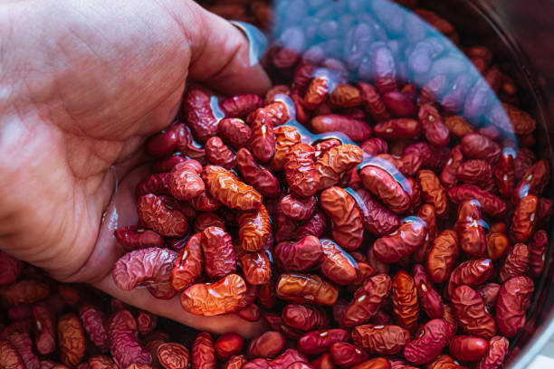 Beans soaking in water resting on the bowl.