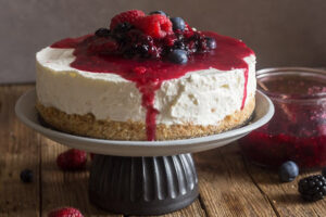 A creamy no-bake cheesecake topped with fresh berries.